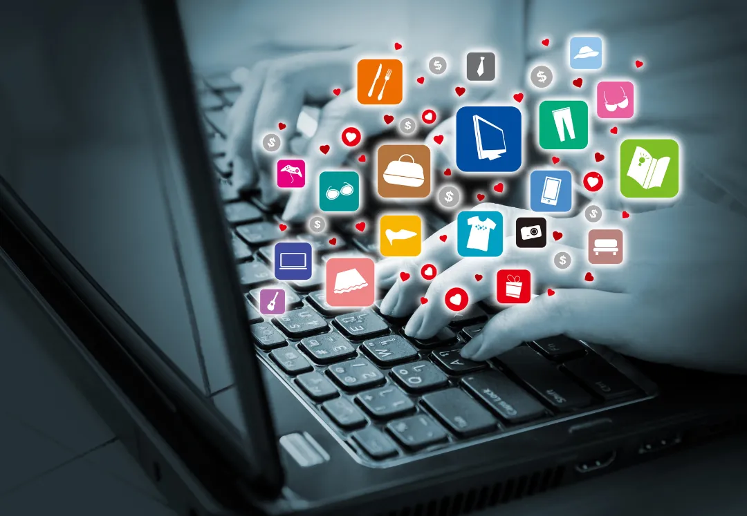 Apps and icons rising from a laptop keyboard