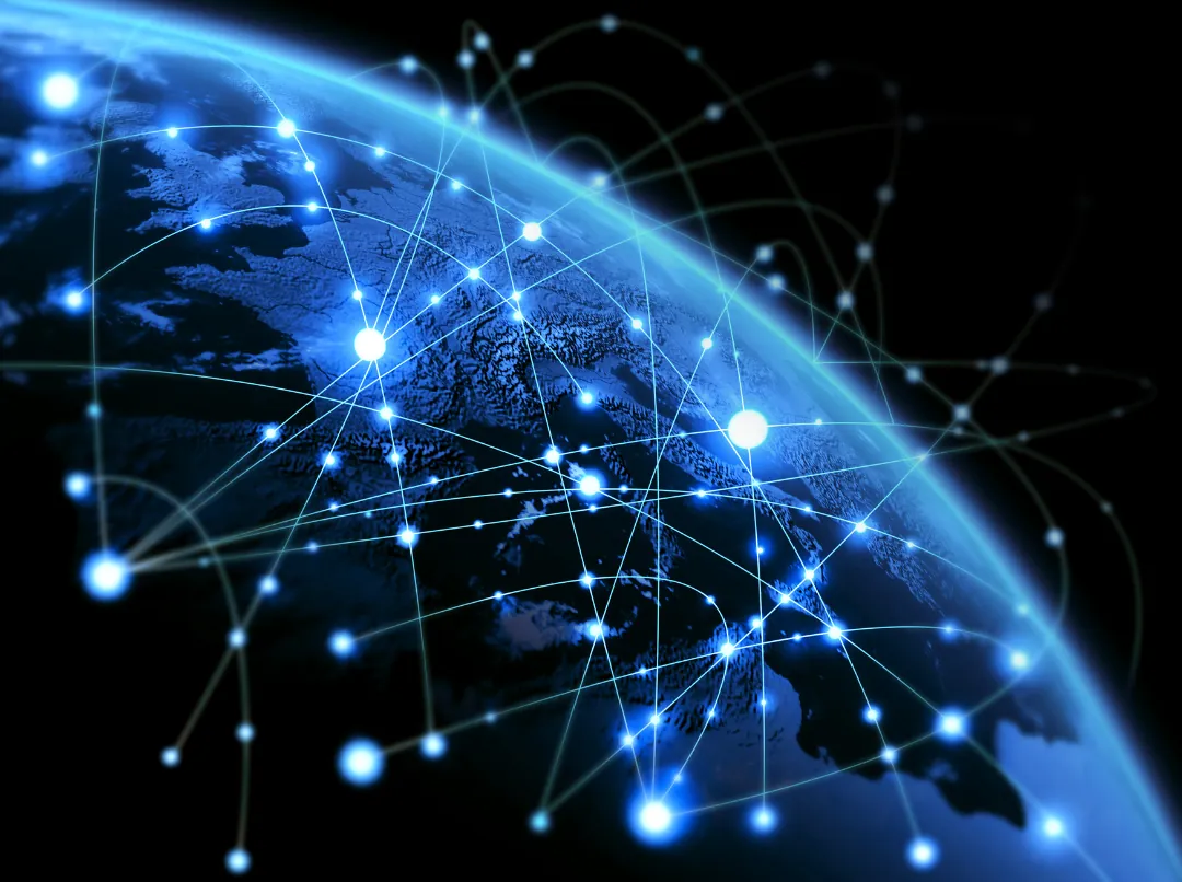 Network of glowing connections across the globe at night