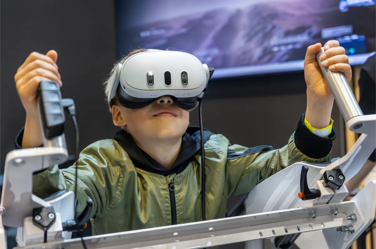 Student wearing a VR headset in a learning simulator